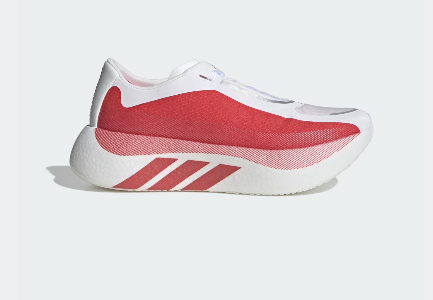 adidas Hyperboost Edge running shoe in white and red, viewed from the side